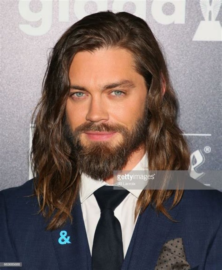 How tall is Tom Payne